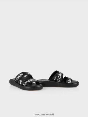 Marc Cain Nykyaikaiset sandaalit MC -kirjaimilla musta jalkineet V0LL481597 Marc Cain Mekko